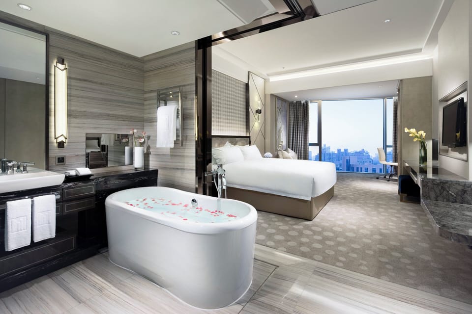 Premium bedding, down comforters, minibar, in-room safe