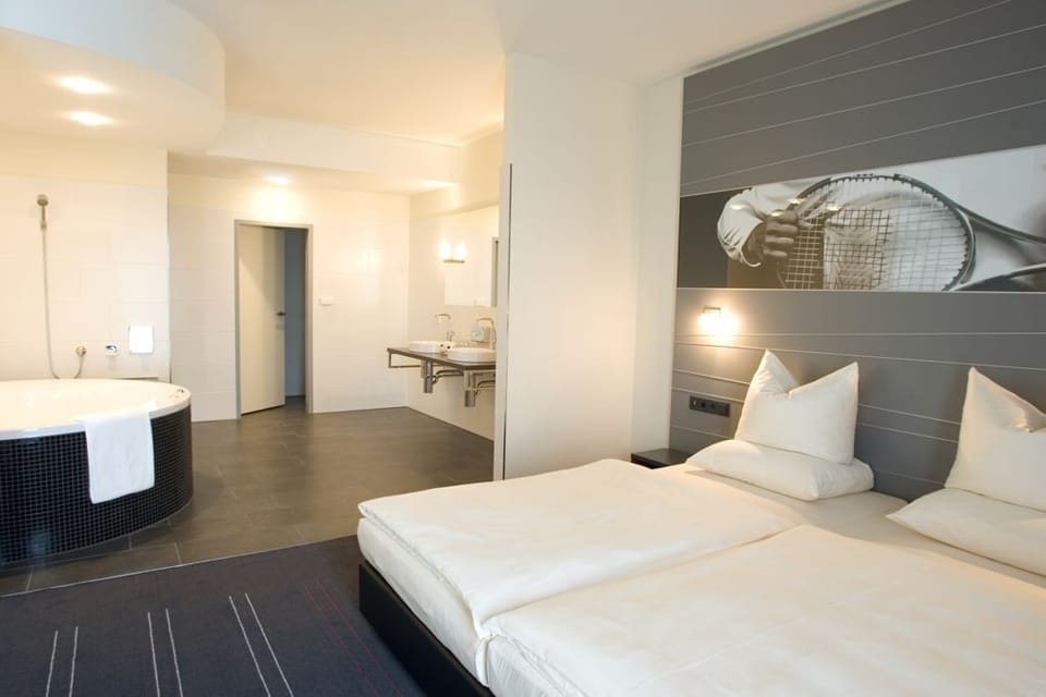 Suite (Champion) | Minibar, in-room safe, desk, laptop workspace