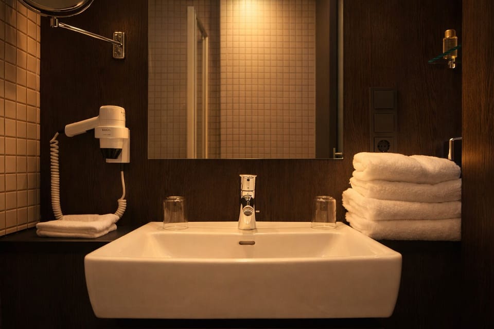 Rainfall showerhead, hair dryer, bathrobes, towels