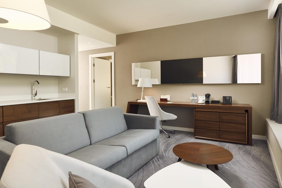 Suite, 1 Bedroom | Living area | 40-inch flat-screen TV with cable channels, TV