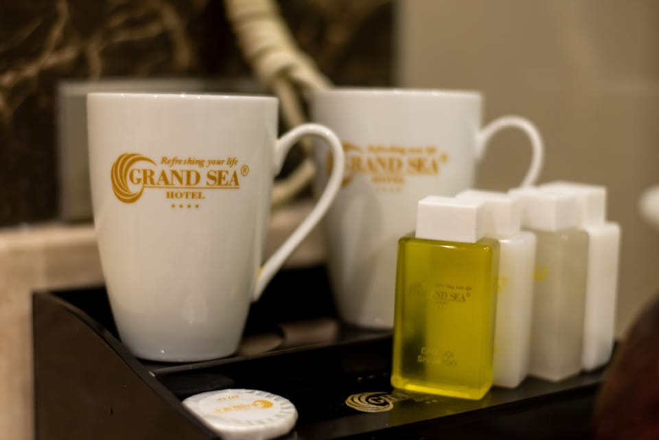 Junior Suite, Balcony, Partial Ocean View | Bathroom amenities | Free toiletries, hair dryer, bathrobes, slippers