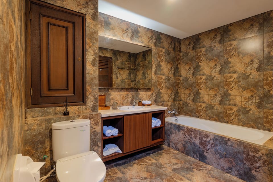 Super Deluxe Double | Bathroom | Separate tub and shower, rainfall showerhead, free toiletries