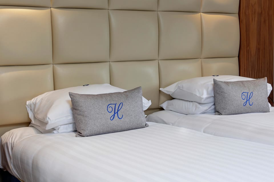 Desk, iron/ironing board, free cribs/infant beds, free rollaway beds