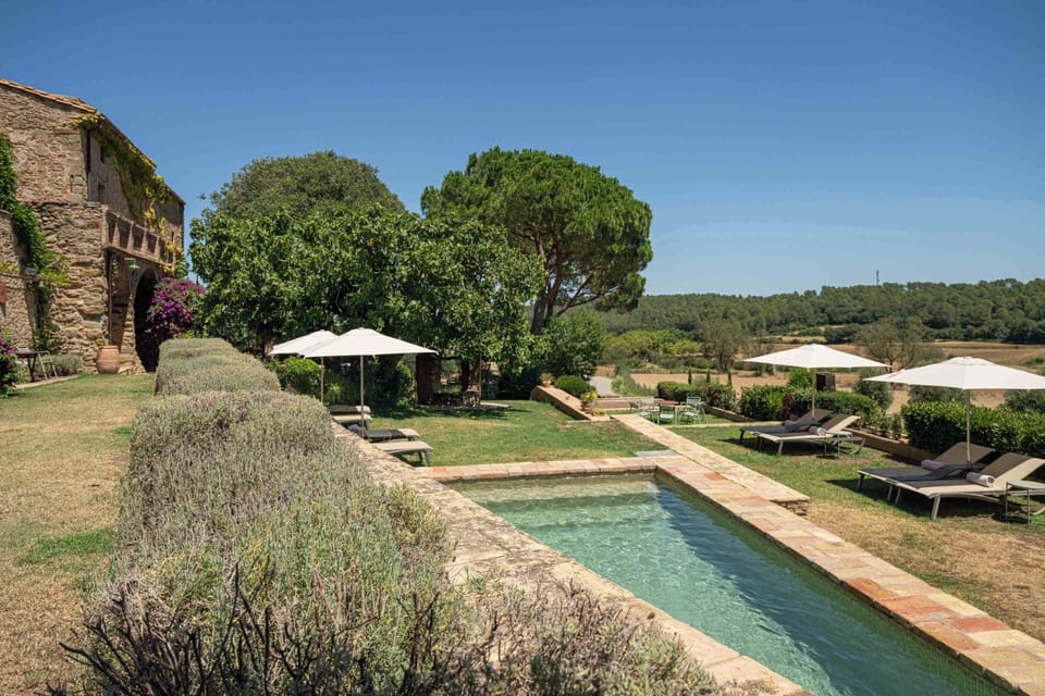 Seasonal outdoor pool, a waterfall pool, sun loungers