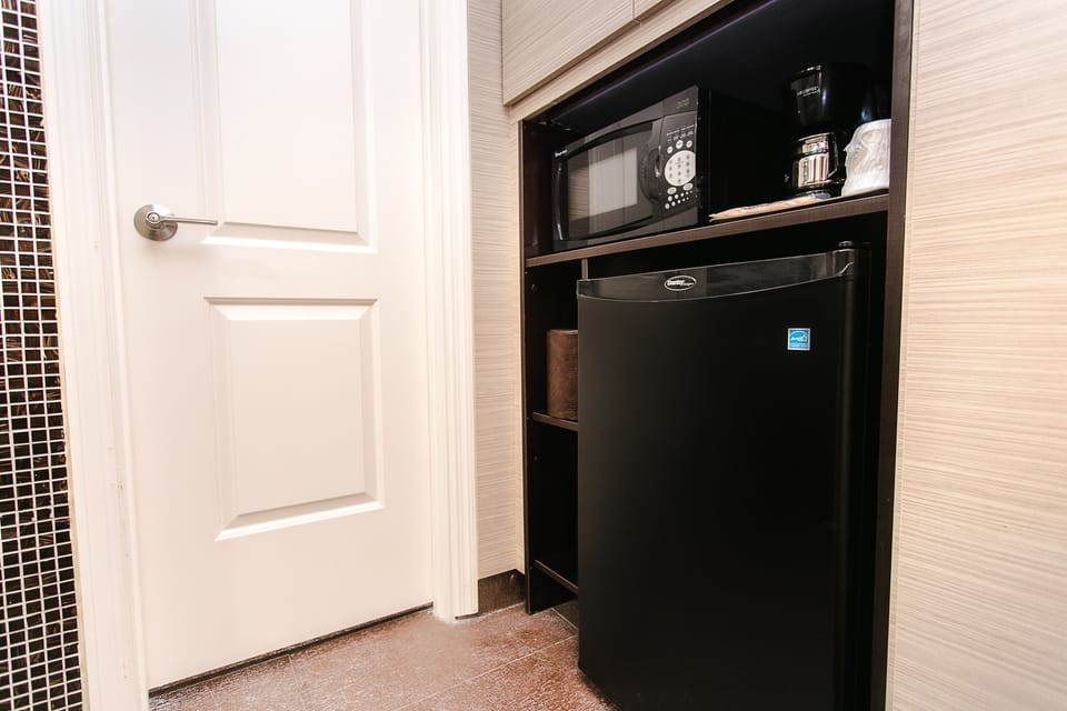 Fridge, microwave, coffee/tea maker, paper towels