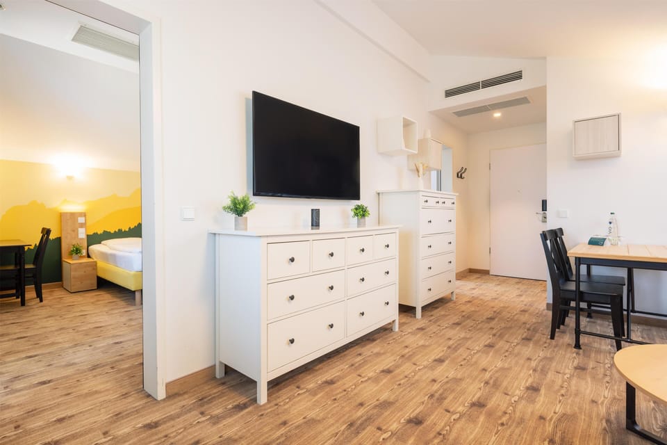 Family Room, Multiple Beds | Premium bedding, in-room safe, desk, laptop workspace