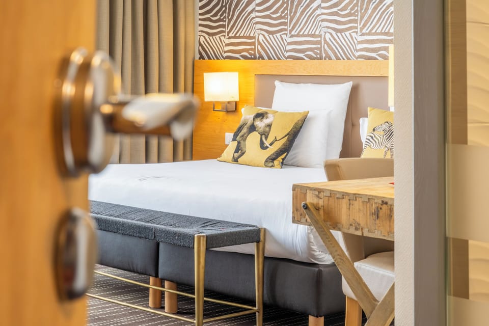 Premium bedding, in-room safe, individually decorated, desk