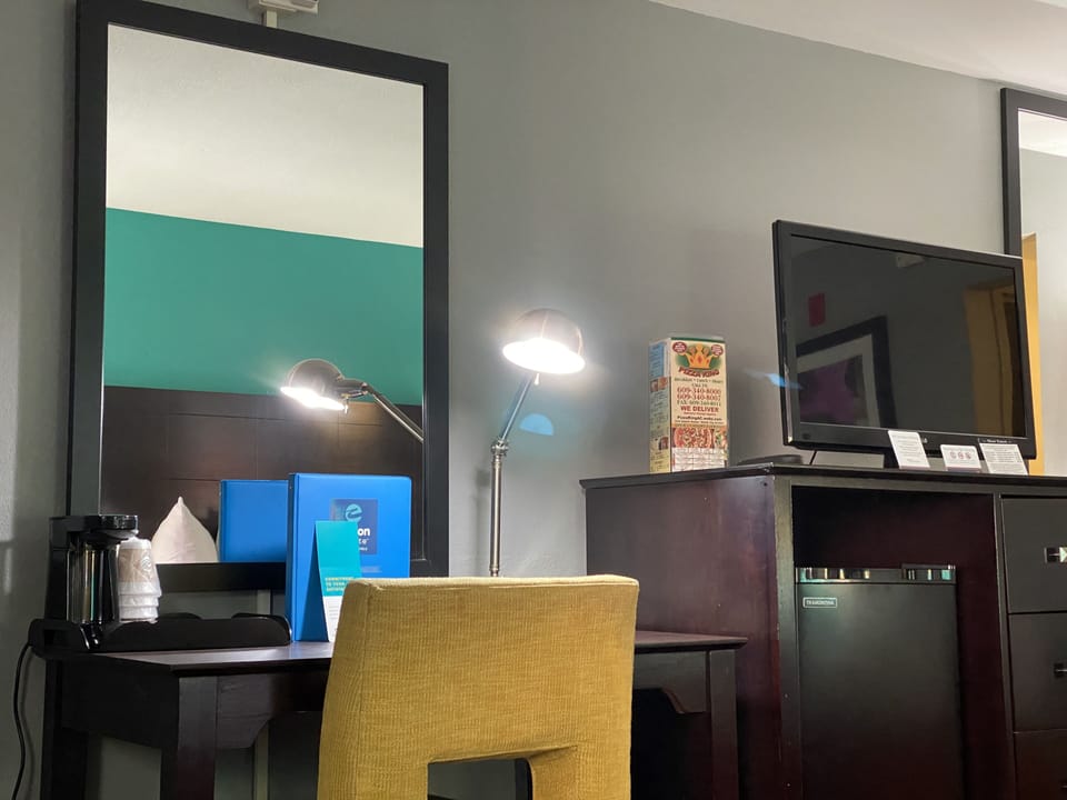 Desk, blackout drapes, soundproofing, iron/ironing board