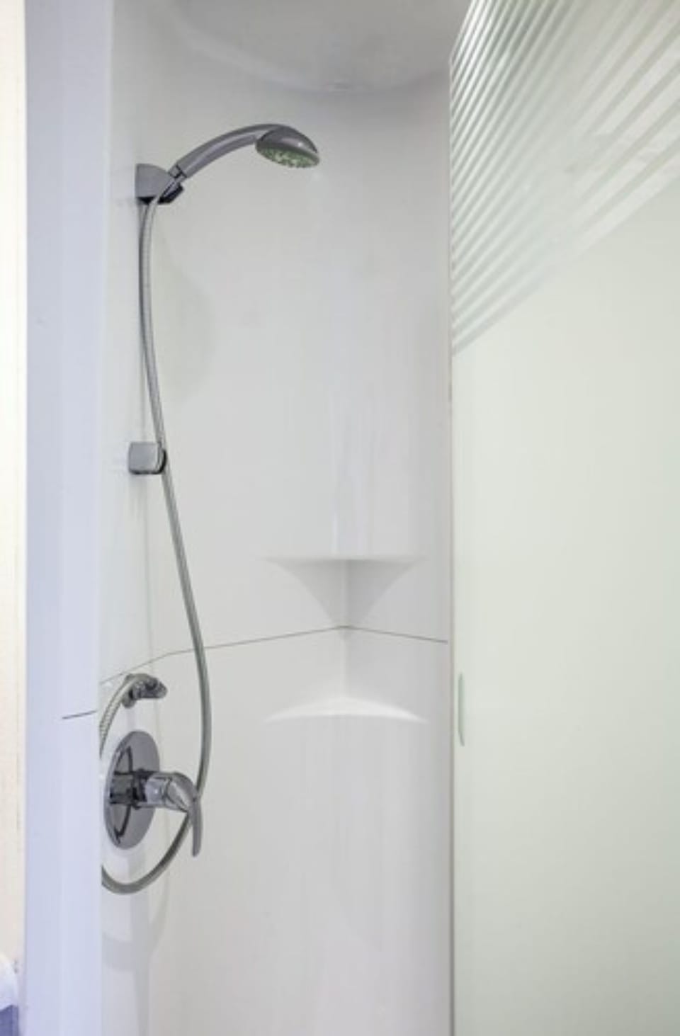 Shower, eco-friendly toiletries, hair dryer, towels