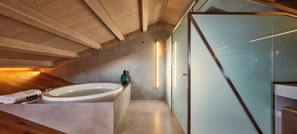 Grand Harbour Master Suite with Balcony and Sea View | Bathroom | Jetted tub, rainfall showerhead, designer toiletries, hair dryer