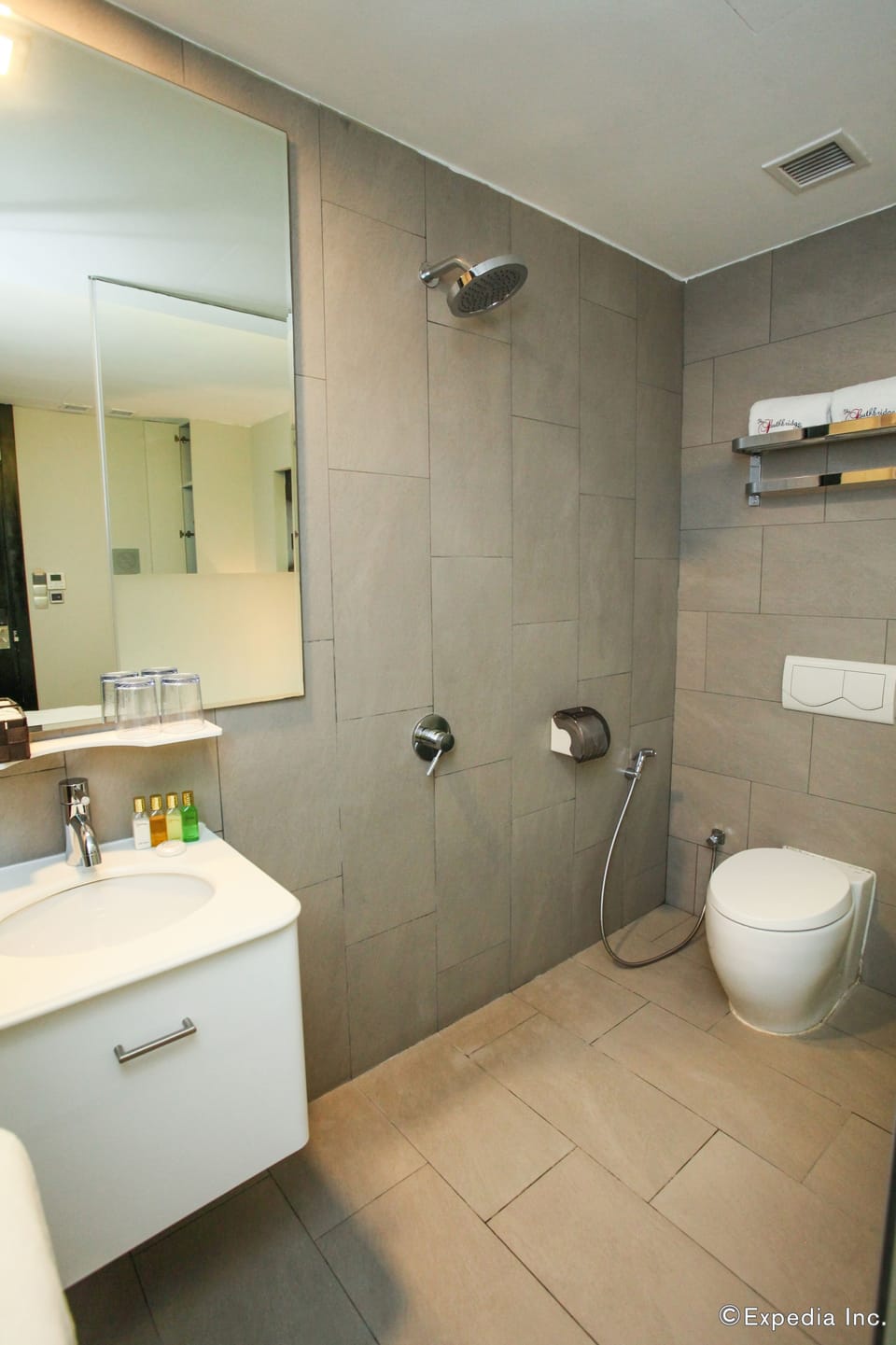 Shower, free toiletries, hair dryer, slippers