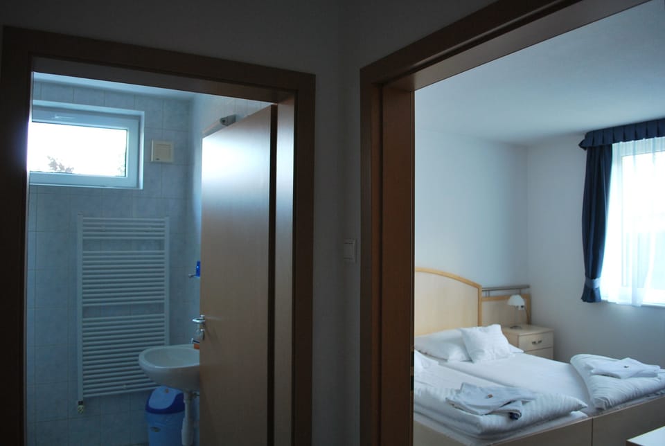 Standard Double or Twin Room | Minibar, in-room safe, blackout drapes, free WiFi