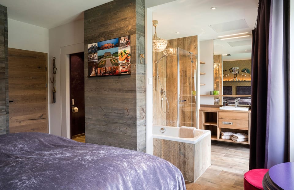 Deluxe Double Room, 1 Bedroom, Balcony, Mountain View | Bathroom | Hair dryer, towels, soap, shampoo