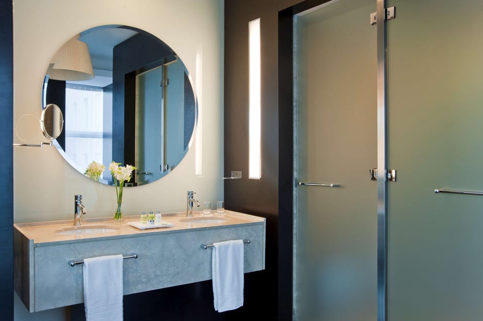 Shower, rainfall showerhead, eco-friendly toiletries, hair dryer