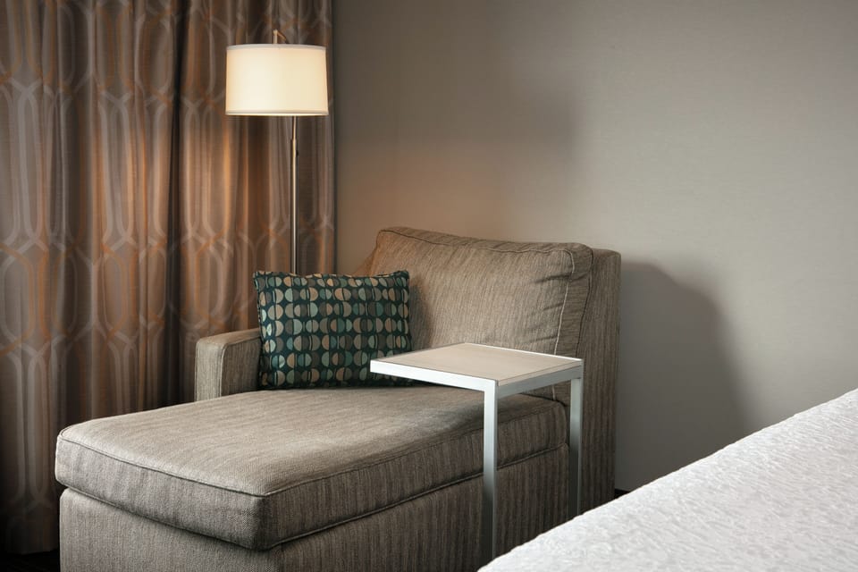 Desk, laptop workspace, iron/ironing board, free cribs/infant beds