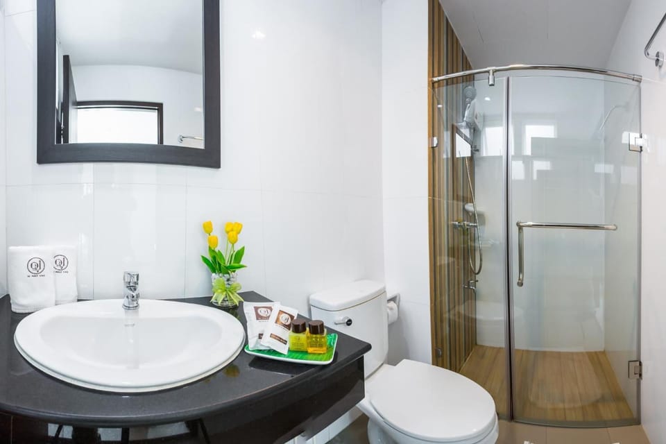 Shower, free toiletries, hair dryer, slippers