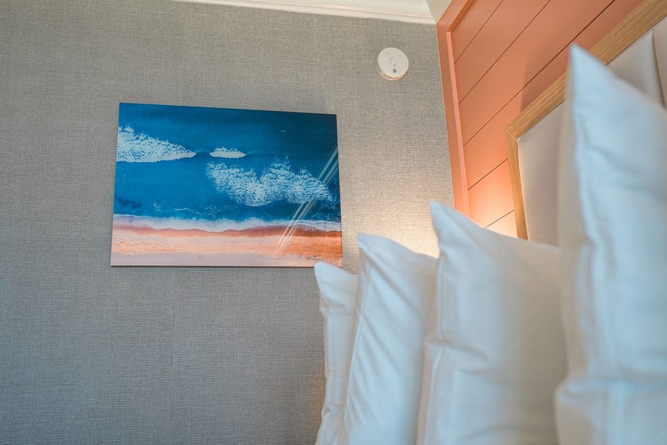 King Guest Room with Sleeper Sofa Inland Building | Premium bedding, iron/ironing board, free WiFi, bed sheets