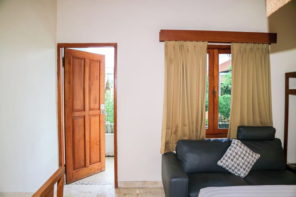 Deluxe Room, Terrace, Pool View | Living area | 43-inch Smart TV with cable channels, Netflix, streaming services