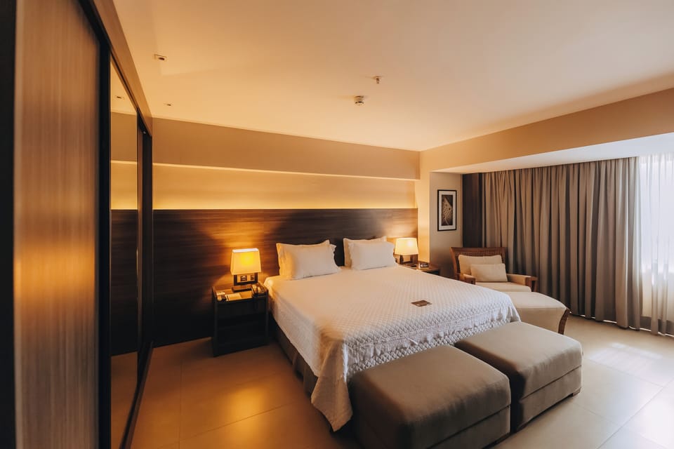 Suite, 1 King Bed, Kitchenette, Sea View | Minibar, in-room safe, individually decorated, individually furnished