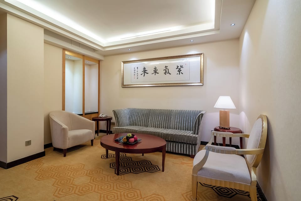 Suite, 1 King Bed, Non Smoking, Mountain View | Down comforters, minibar, in-room safe, desk