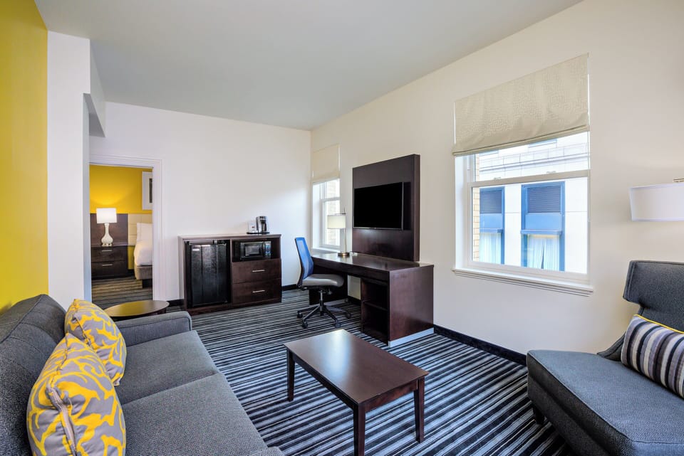 Suite, 1 King Bed with Sofa bed | Premium bedding, desk, iron/ironing board, free cribs/infant beds
