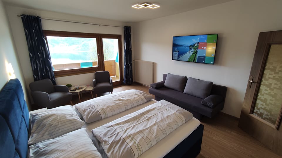 Standard Quadruple Room, 2 Bedrooms, Non Smoking, Lake View | Free WiFi, bed sheets