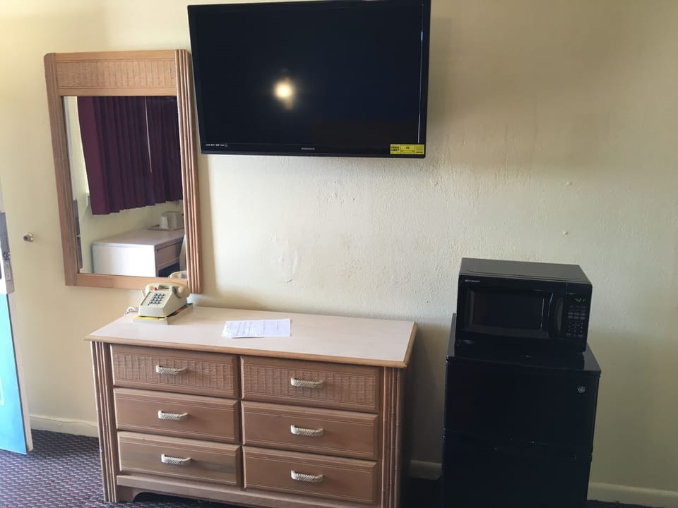 Room, 2 Queen Beds | Desk, blackout drapes, iron/ironing board, free cribs/infant beds