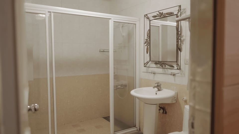 Standard Double Room, 1 Bedroom | Bathroom | Shower, hair dryer, slippers, towels