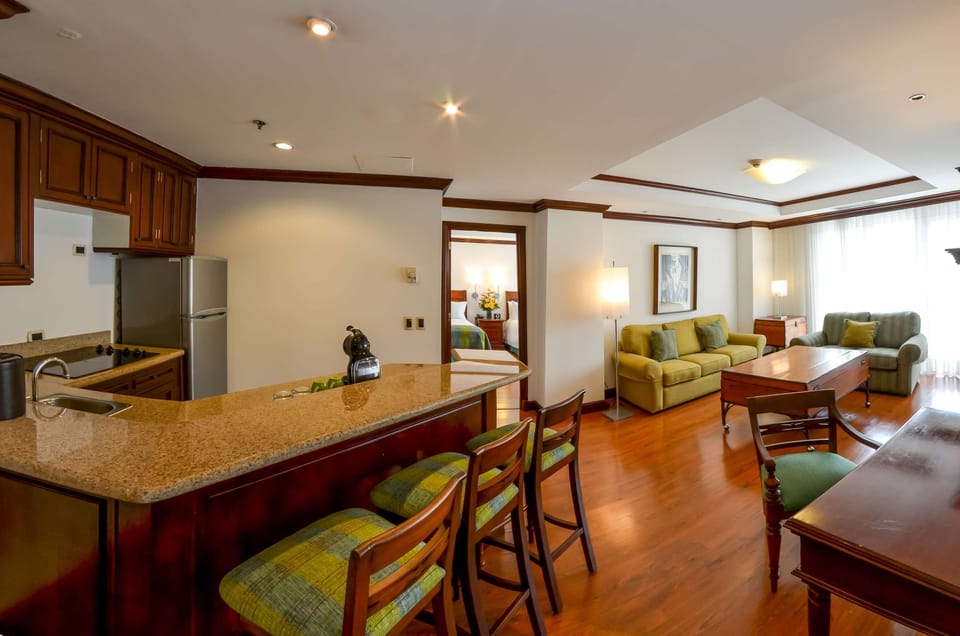 Master Suite, 2 Double Beds | In-room safe, desk, laptop workspace, blackout drapes