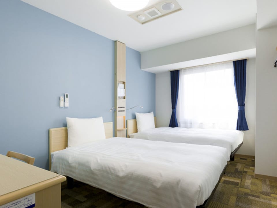 Desk, laptop workspace, free WiFi, bed sheets