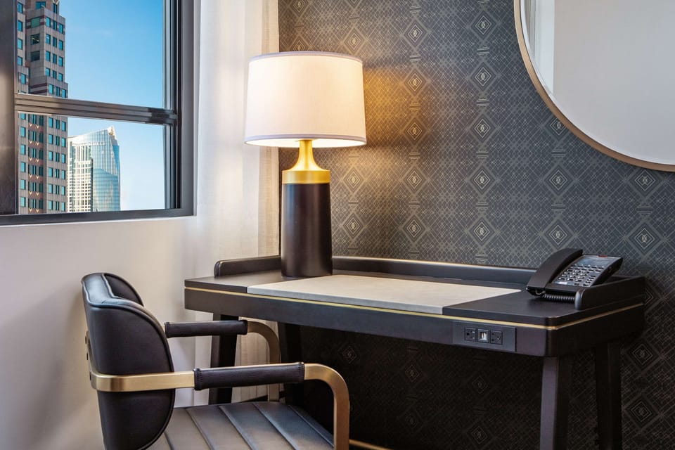 Premium bedding, down comforters, pillowtop beds, in-room safe