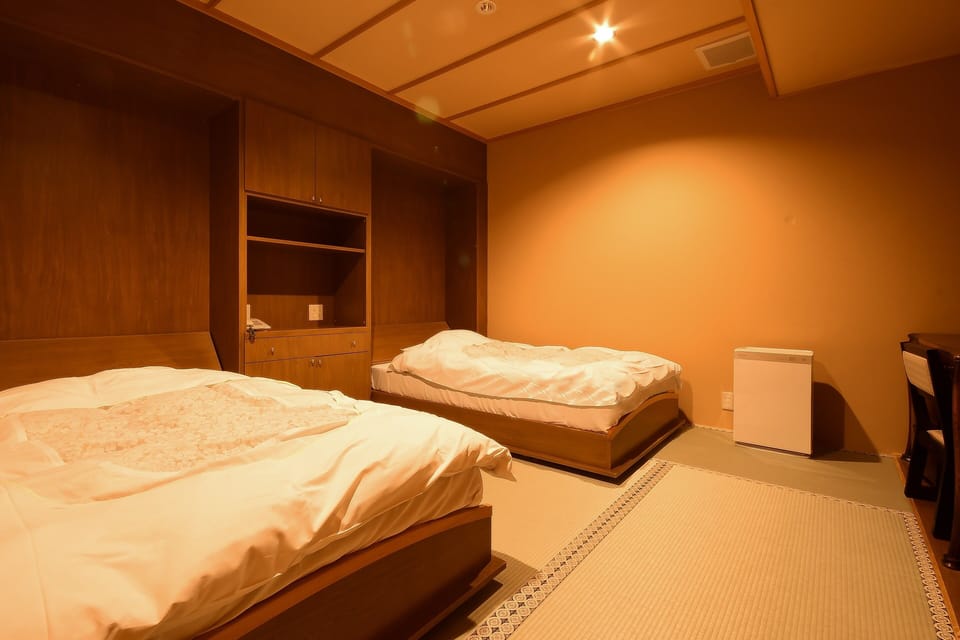 Suite, Non Smoking, Garden View | Down comforters, in-room safe, desk, WiFi (free)
