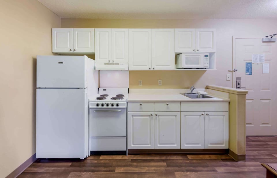 Fridge, microwave, stovetop, coffee/tea maker