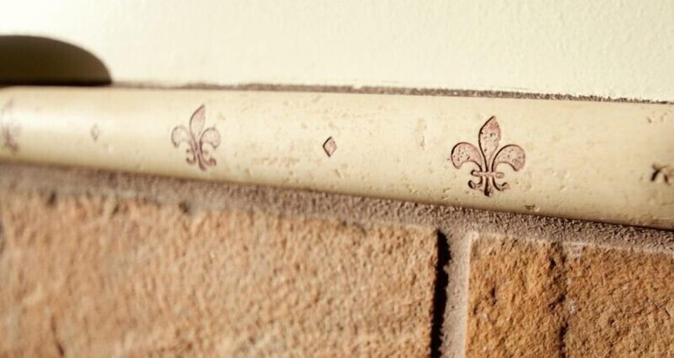 Fleur de Lis | Premium bedding, iron/ironing board, rollaway beds, free WiFi