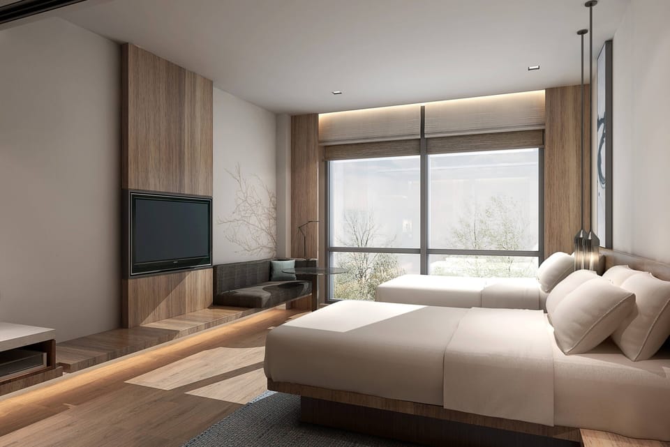 Deluxe Room, 2 Twin Beds, City View | In-room safe, desk, laptop workspace, blackout drapes