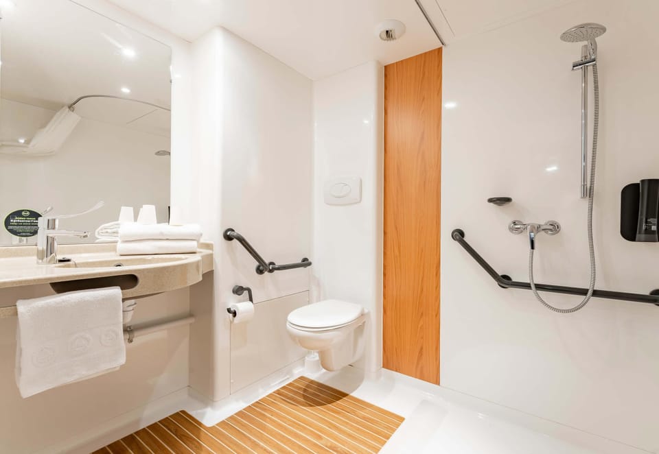 Shower, free toiletries, hair dryer, towels