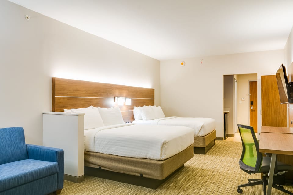 Suite, 2 Queen Beds | In-room safe, individually decorated, desk, blackout drapes