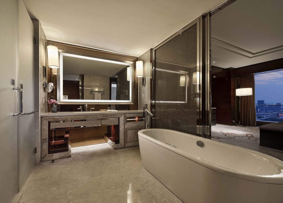Combined shower/tub, hair dryer, bathrobes, slippers