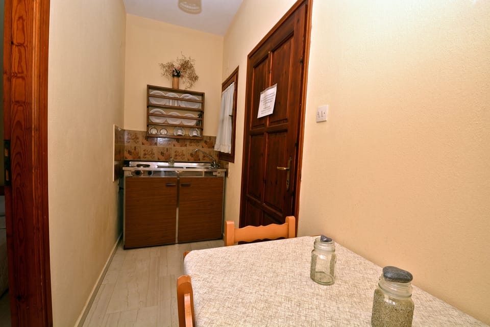 Studio, Partial Sea View | Private kitchenette | Fridge, stovetop, coffee/tea maker, electric kettle