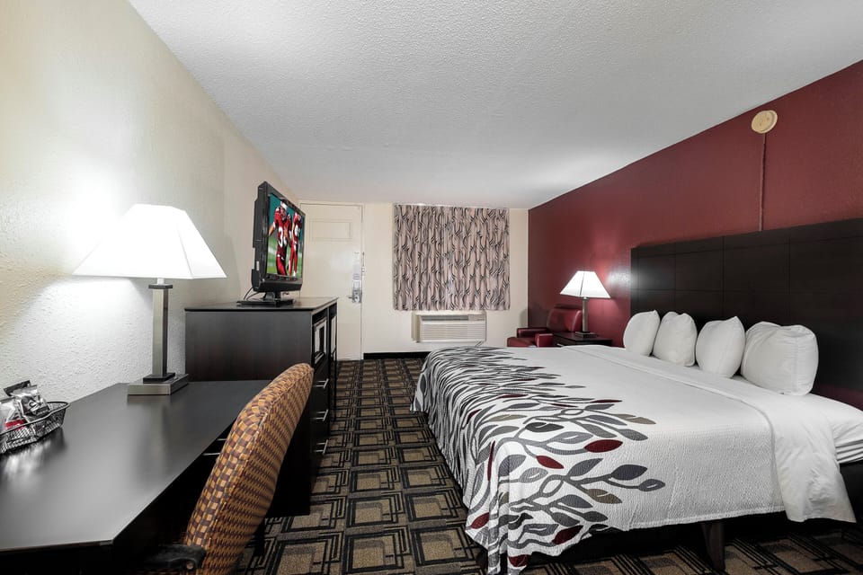 Desk, laptop workspace, cribs (free), WiFi (free)