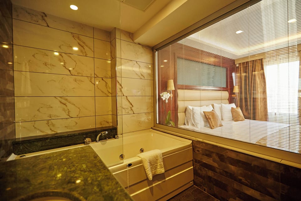 Shower, free toiletries, hair dryer, bathrobes