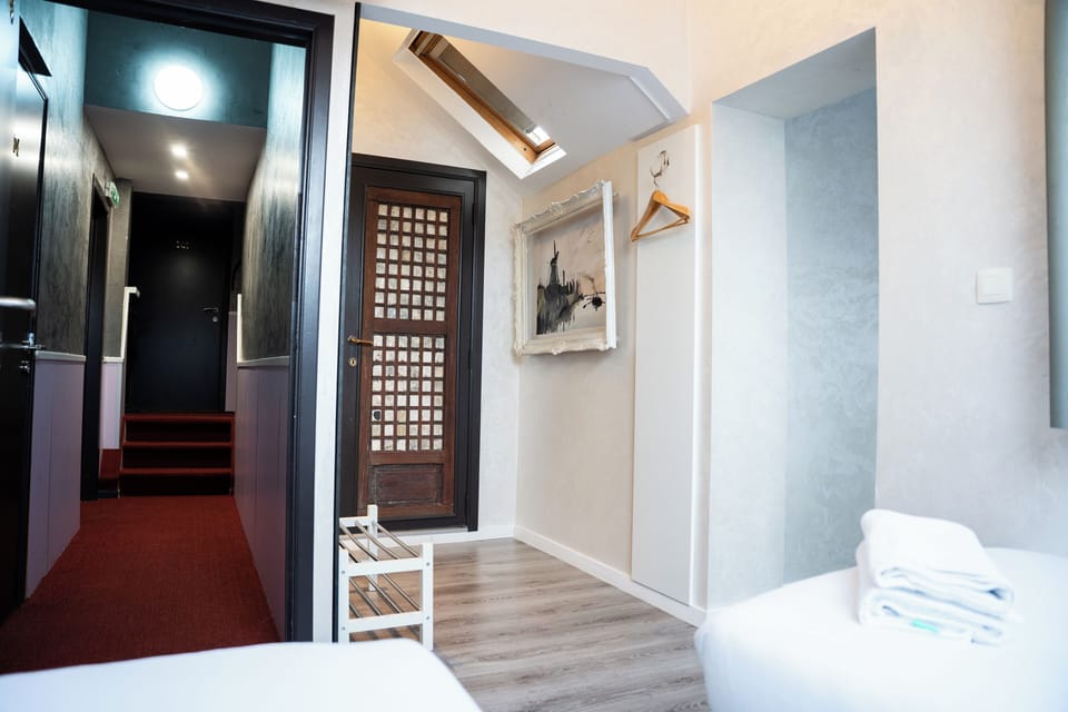 Standard Twin Room | Pillowtop beds, individually decorated, desk, iron/ironing board