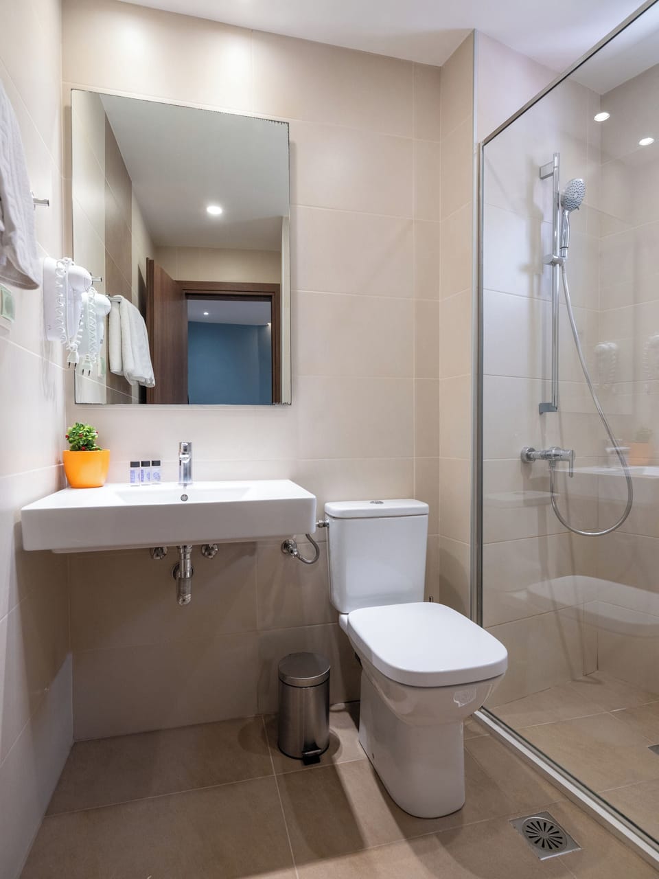 Shower, free toiletries, hair dryer, towels
