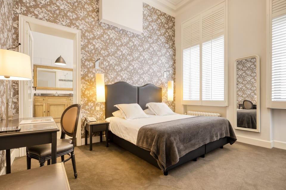 Executive Room | Premium bedding, in-room safe, individually decorated