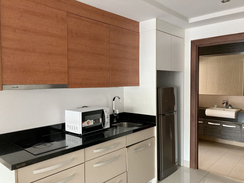 Condo, 2 Bedrooms | Private kitchen | Fridge, microwave, stovetop, electric kettle
