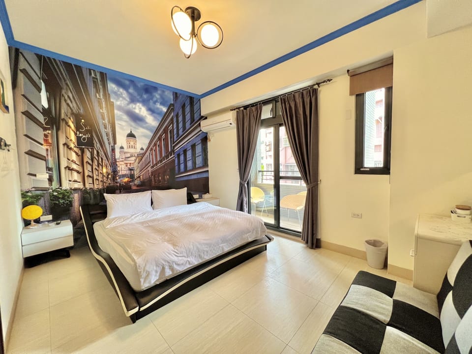 Deluxe Double Room with Balcony | Individually decorated, individually furnished, desk, blackout drapes