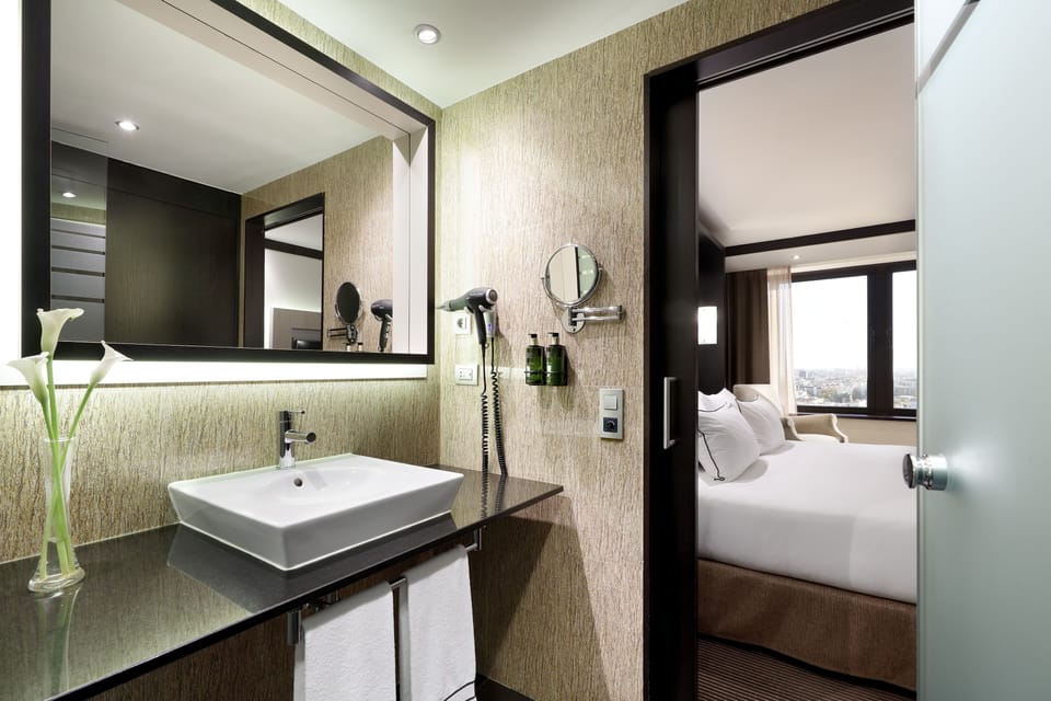The Level Room | Premium bedding, minibar, in-room safe, desk