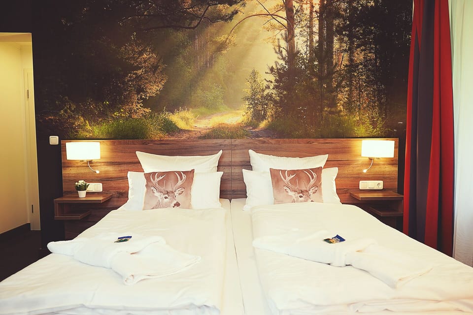 Comfort Double Room | In-room safe, individually decorated, desk, cribs/infant beds