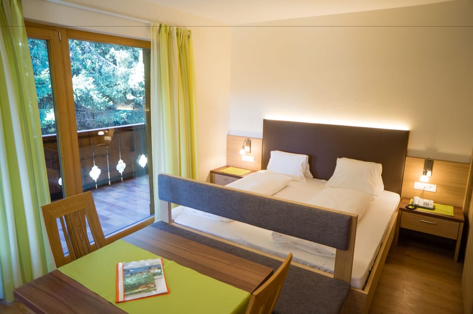 Double Room, Garden View | In-room safe, desk, free WiFi, bed sheets