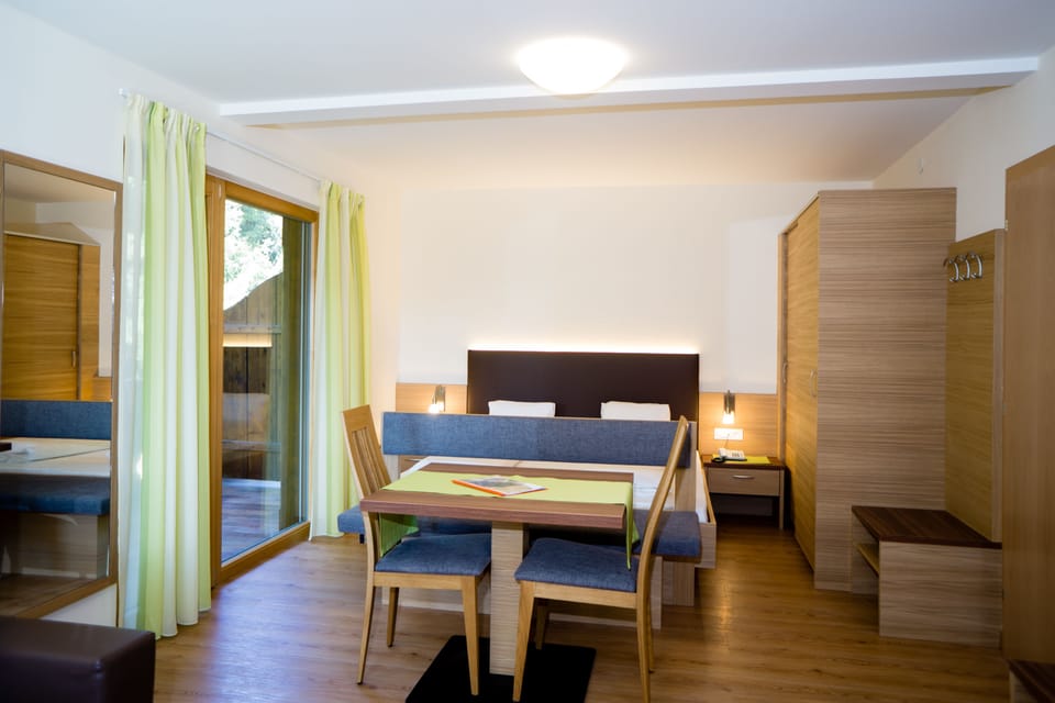Double Room, Garden View | In-room safe, desk, WiFi (free), bed sheets